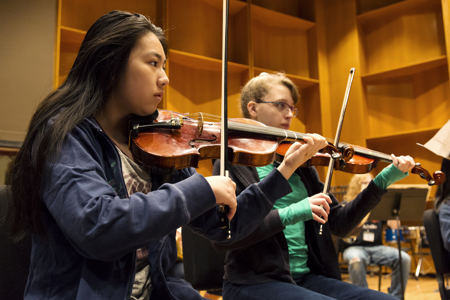 Two strings students play on stge during the 2017 UAF Summer Music Academy. UAF Photo by Sarah Manriquez