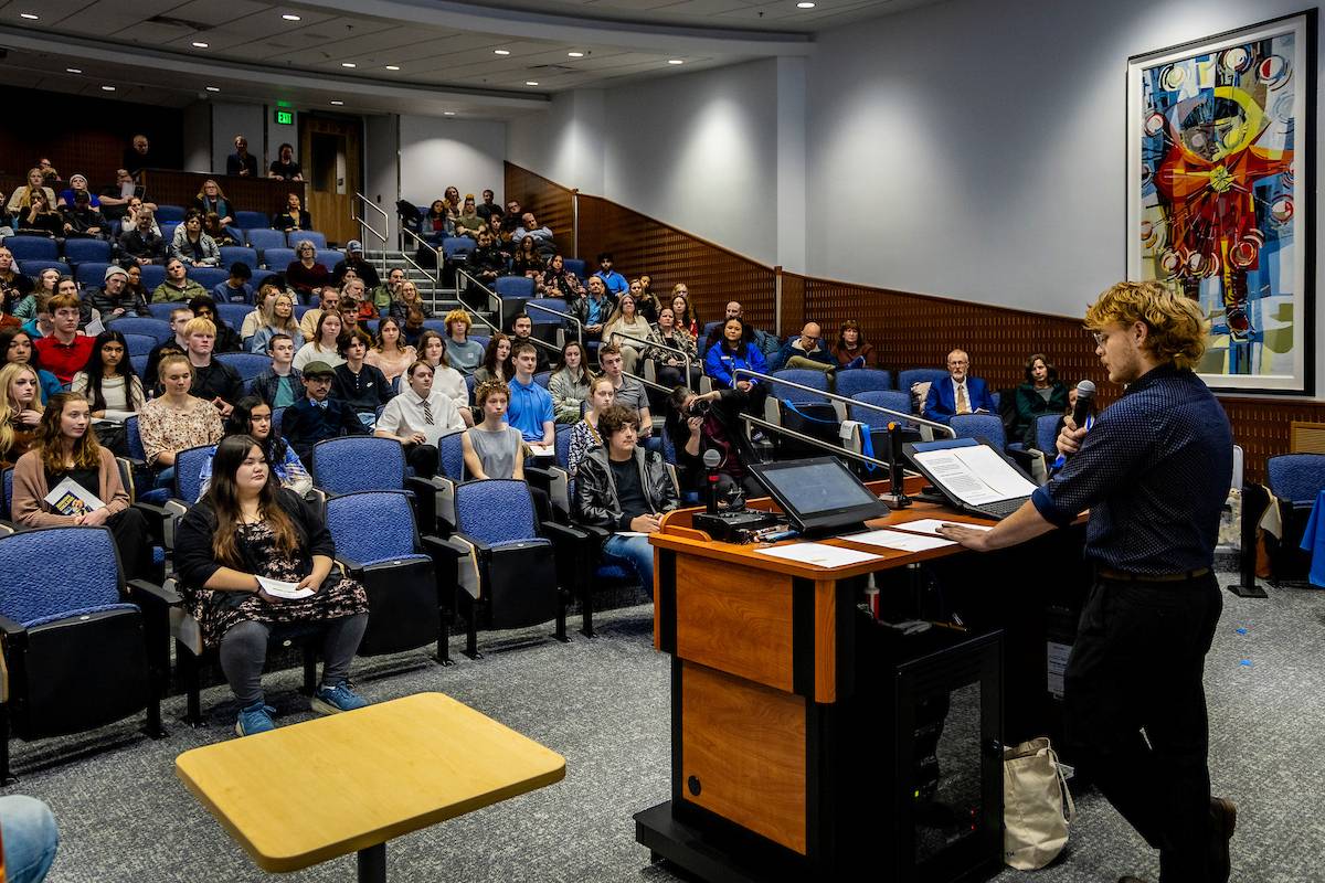 Eli gives a prestation in the UAF Schaible Auditorium