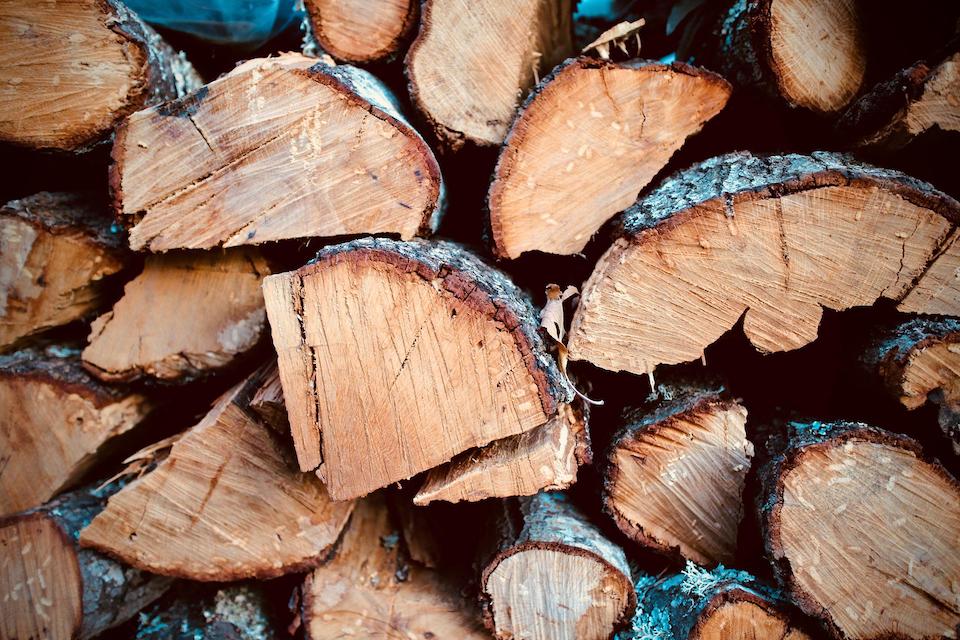 Firewood is split and stacked to dry.