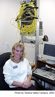Shannon surrounded by computer cords