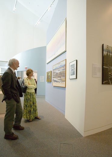 People exploring the art gallery