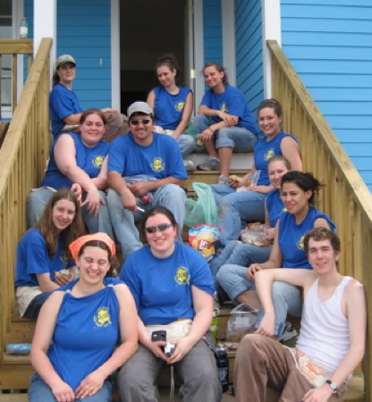 The whole UAF ASB team gathered for a group photo on the porch of a Habitat house. Front row, left to right: Clarissa Ribbens, Kari Pile and Brian Lyke. Second row: Megan Richards and Alexis Fernandez. Third row: Erica Milstead, Temple Dillard, Tabitha Johnson and Cynthia Lashinski. Top row: JJ Boggs, Erica Schooley and Emily Schooley. Photo courtesy of New Orleans Habitat for Humanity