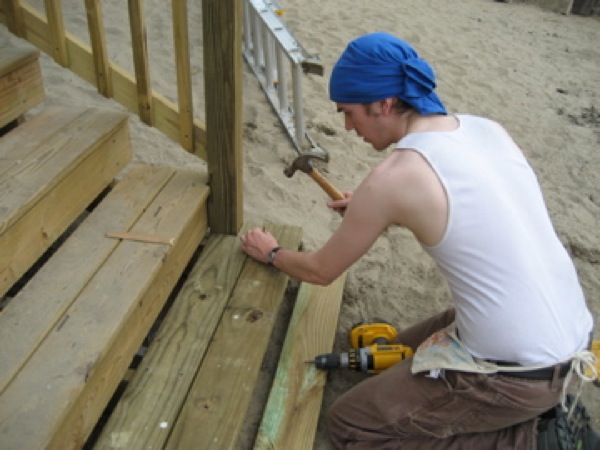 Brian Lyke builds some stairs. Photo by Kari Pile