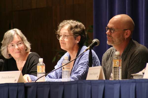 Peggy Shumaker, Ann Chandonnet and Derick Burleson participate in a panel discussion at the Wood Center.