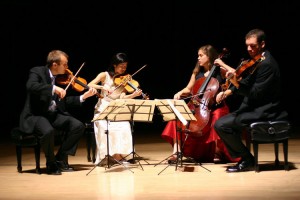 Photo by David Long. Violinist J Freivogal and Sae Niwa, cellist Rachel Henderson Freivogel and violist Sam Quintal perform as the Jasper String Quartet. The group will perform a chamber music concert in the Davis Concert Hall on the University of Alaska Fairbanks campus June 1. 