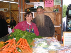 Photo courtesy Nancy Tarnai. Barb and Gary McLean pause at the Tanana Valley Farmers' Market Aug. 18.
