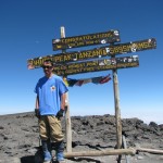 Photos courtesy of Jenny Heckathorn.. 14-year-old Spencer Adams of Palmer on top of Mt. Kilimanjaro in Tanzania.