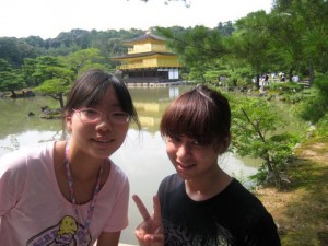 Photo courtesy of Kaylyn Hale. Kaylyn Hale and her Japanese host, Mayu, viewed the Golden Pavilion Rokuon-ji temple in Kyoto, Japan during a summer 2010 visit through the Alaska 4-H Exchange Program.