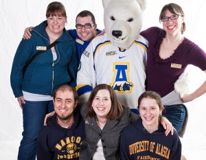 The UAF Admissions counselors pose with a special friend March 25 after hosting prospective future UAF students and their parents during the annual InsideOut event on the Fairbanks campus. From left to right, back to front, are Carrie Coxon, Joe Alloway, Nanook, Mary Kreta, Chris Wheeler, Lael Oldmixon and Jessica Bennett.