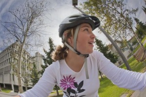 Journalism major Teri Anderson rides her bike around the Fairbanks campus.