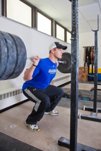 Goaltender Scott Greenham, recently voted Most Valuable Player by his fellow Nanooks, works out in the weight room as part of his off-season regimen. UAF photo by Todd Paris