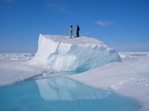 Photo by Daniel Pringle.  Matt Druckenmiller, right, and his research advisor Hajo Eicken, a professor of Geophysics, on an ice floe near Barrow.