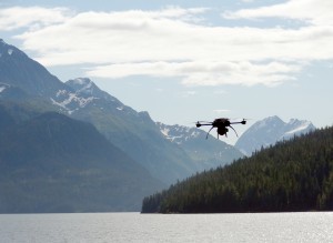 Photo by Greg Walker. The unmanned aerial vehicle Scout flies over Prince William Sound during testing this month. 