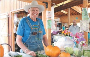 Photo by Nancy Tarnai. Virgil Severns has been selling his produce from Range View Farm at the Tanana Valley Farmers Market for decades.