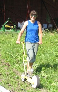 Photos couresty of Pioneer Produce. Jennifer Becker uses a precision seeder at her farm in North Pole.