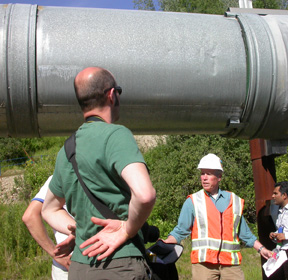 UAF photo by Ned Rozell. Engineer Elden Johnson, seen here giving a pipeline talk in 2008.
