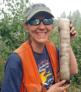 Photo courtesy of Margaret Darrow. Darrow holds a sample of ice-rich soil.