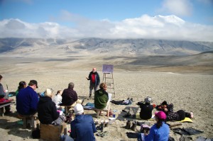 Photo by Pavel Izbekov. Students of the 2011 International Volcanological Field School take in a lecture in Katmai National Park & Preserve with the Valley of Ten Thousand Smokes and Mount Griggs as the backdrop.