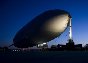 NASA/Eric James, Oct. 6, 2009. NASA conducts airborne science aboard Zeppelin airship: equipped with two imaging instruments enabling remote sensing and atmospheric science measurements not previously practical. Shown here in pre-flight checkouts aboard the Zeppelin NT coupled to mobile mast.