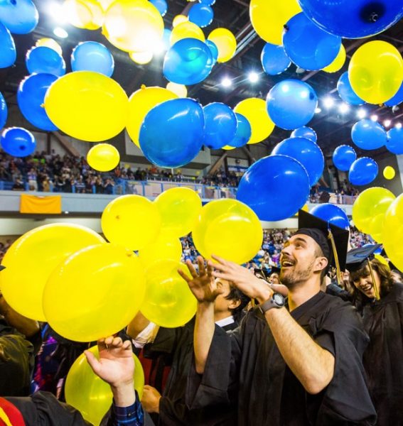 UAF photo by Todd Paris. Balloons cascade onto the floor at the end of the University of Alaska Fairbanks' 2015 commencement ceremony in the Carlson Center. UAF will host its 97th commencement on Saturday, May 4, 2019.