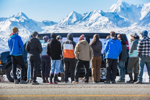 Photos by Meghan Murphy. Geoscience students gather at a roadside turnout during an April field trip to study geological features along the Richardson Highway.