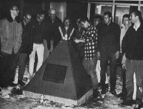Engineering students gather at the stone in this photo from the 1967 Denali yearbook.