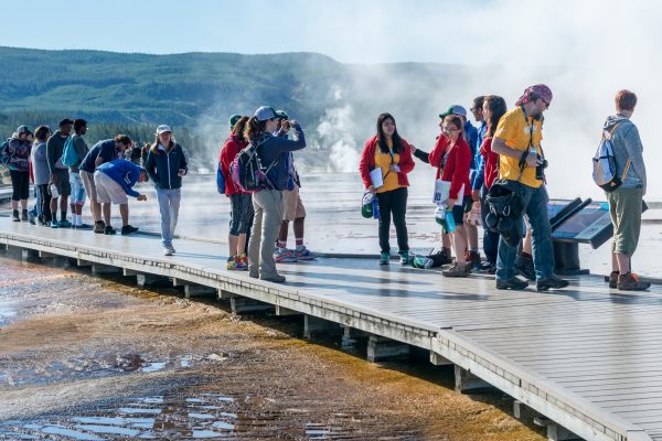 Photo by Colby Wright.  The first GeoFORCE Alaska cohort visits Yellowstone National Park while studying the geologic features of the Rocky Mountains in 2015, their fourth year in the program.