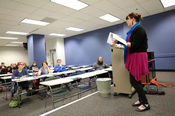 Photo by Sean Holland.  Robin Shoaps, a University of Alaska Fairbanks assistant professor of anthropology and linguistics, leads a class in her course titled Klingon, Elvish and Dothraki: The Art and Science of Language Creation. Shoaps' 25 students invented a new language called Fosk.