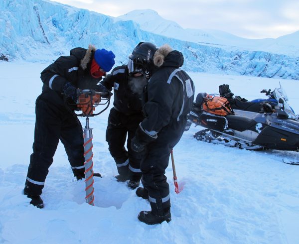 Photo courtesy of Mark Johnson. UAF researcher Mark Johnson, left, takes an ice core sample with colleagues Evgeny Karulin, with the State Marine Technical University of St. Petersburg, and Aleksey Marchenko, of the University Centre in Svalbard, on the Norwegian archipelago of Svalbard.