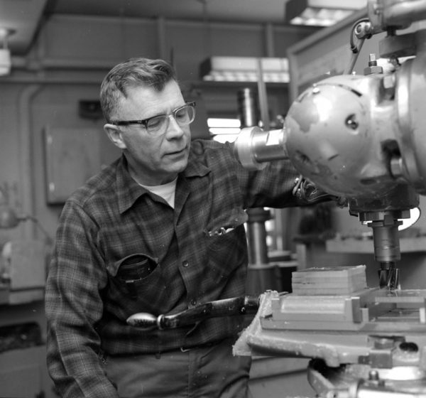 Photo courtesy of UAF Geophysical Institute.  Jim Parry, the Machine Shop supervisor in the 1960s and 1970s, works on a project in this undated photo.