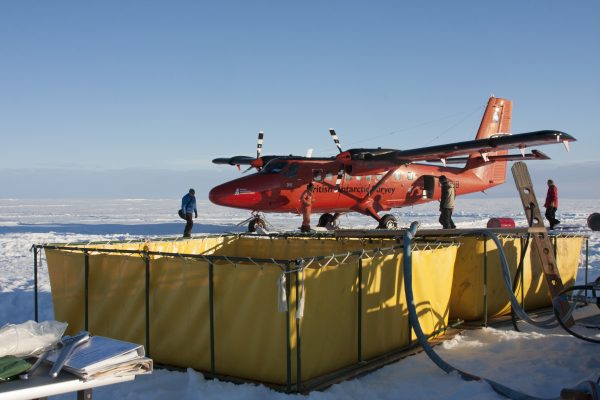 Photo by Martin Truffer.  These portable water pools in Antarctica are part of an ice-drilling operation. The system heats the water to about 158 degrees Fahrenheit and pumps it down a hole. The water is recovered and returned to the pool.