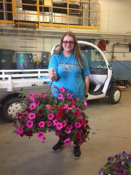 Photo by Natasha Pomeroy. Business major Xena Saunders won one of the flower basket raffles.