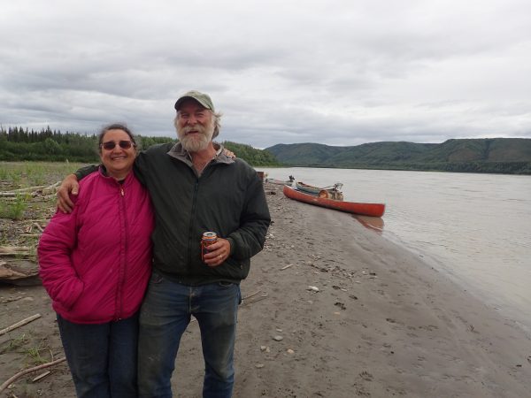 Photo by Ned Rozell. Karen Kallen-Brown and Randy Brown enjoy their fish camp on the Yukon River.