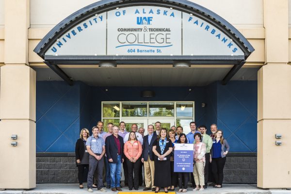 U.S. Secretary of Labor Alexander Acosta and U.S. Senator Dan Sullivan pose for a photo with UAF Community and Technical College students, staff, faculty and community partners in front of CTC's downtown center. UAF photo by JR Ancheta.