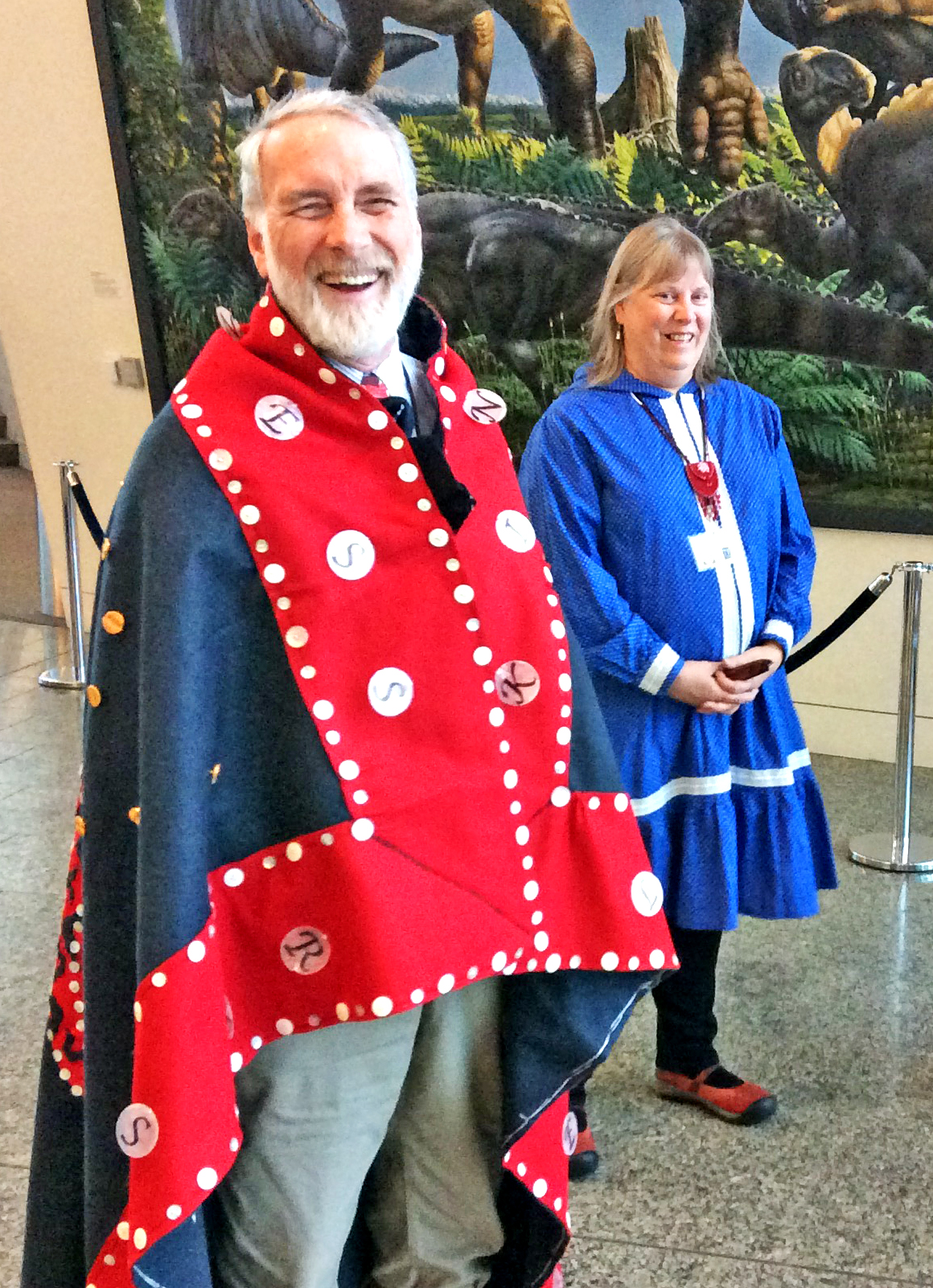 UAMN photo. UA Museum of the North docents Tim Doran and Tish Perkins wait to greet students for a directed discovery tour.