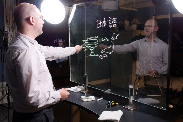 The Learning Glass, or lightboard, is a novel amalgam of existing technologies that allows one to present written content while still facing the audience. It is one of many options instructors have when deciding how to deliver their content.