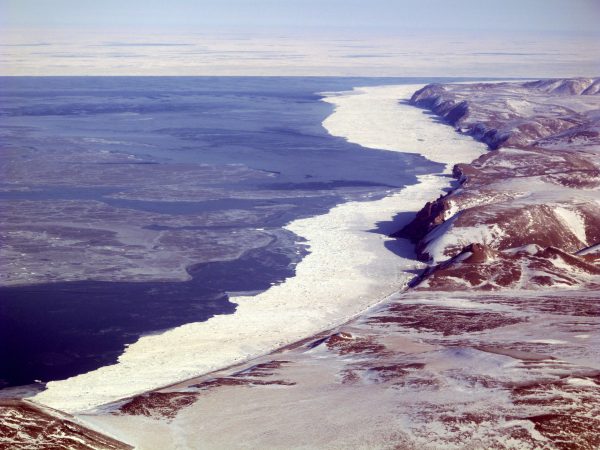 Photo by Ned Rozell. Sea ice and open water surround Cape Lisburne off Alaska’s northwest coast in 2011.