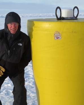 Photo courtesy of Mike DeGrandpre. Mike DeGrandpre works on the sea ice during an Arctic cruise.