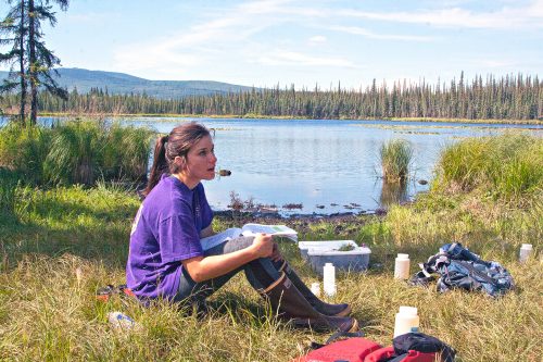 Photo by Tanya Clayton. Chemistry instructor Ragen Davey monitors student activities during an Alaska Summer Research Academy expedition to Smith Lake on the University of Alaska Fairbanks campus in 2018.
