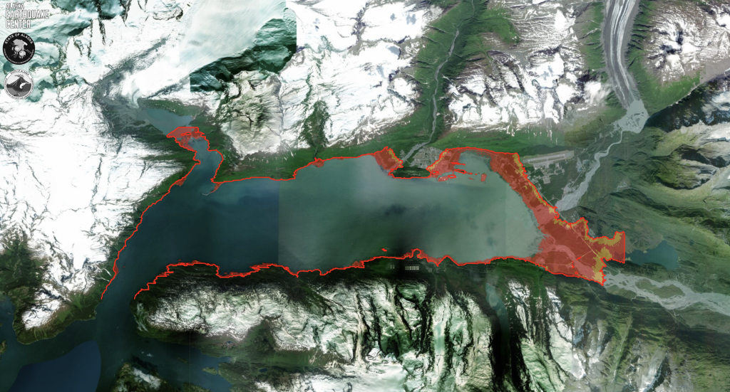 Alaska Earthquake Center. The city of Valdez is shown in the Alaska Tsunami Hazard Map Tool. The tool is a web-based map portal that displays potential tsunami hazard zones for settlements across Alaska. The red line represents the estimated maximum extend of tsunami flooding, while the colored portions represent estimated water depth.