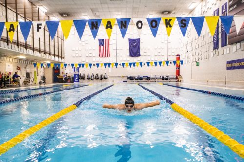A member of the 2019-2020 Nanooks swim team practices in the Patty pool. UAF photo by JR Ancheta.