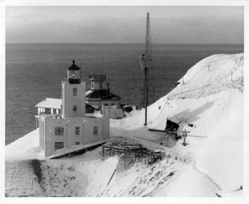 Photo courtesy National Oceanic and Atmospheric Administration's National Centers for Environmental Information, Coast Guard. Scotch Cap Lighthouse sits on the southwest shore of Unimak Island two months before the giant wave of April 1, 1946.