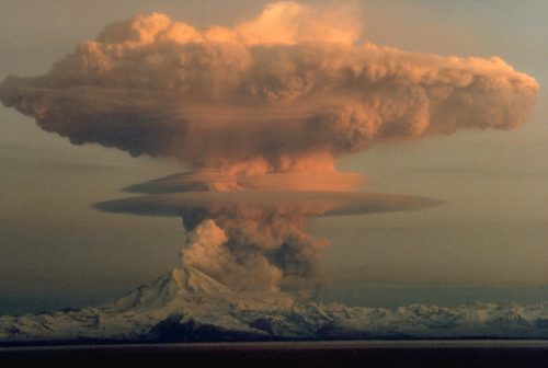 Photo by Robert Clucas. Mount Redoubt west of Kenai erupts an ash cloud on April 21, 1990, during the same unrest that launched the fledgling Alaska Volcano Observatory.