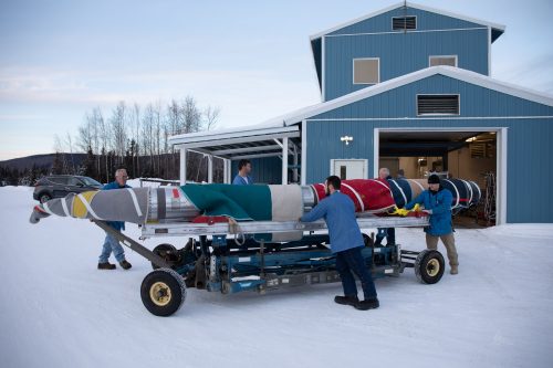 NASA photo by Chris Perry. On Jan. 22, 2019, the payload portion of a NASA sounding rocket is wrapped and rolled outside in anticipation of a launch from Poker Flat Research Range north of Fairbanks.