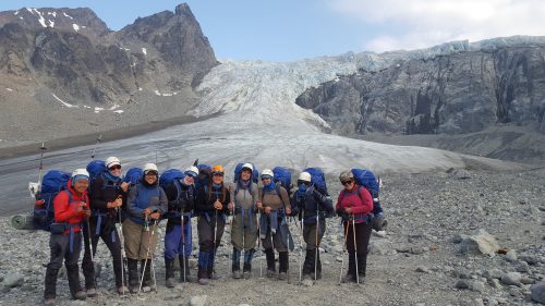 Photo by Brita Irving. The 2019 Girls on Ice team poses while mountaineering on the Gulkana Glacier in Alaska's eastern Interior region.