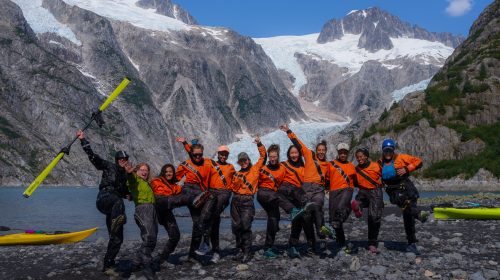 Photo by Erin Pettit. The 2019 Girls in Icy Fjords team takes a break while sea kayaking near the tidewater glaciers of Northwestern Fjord on the southeastern coast of Alaska's Kenai Peninsula.