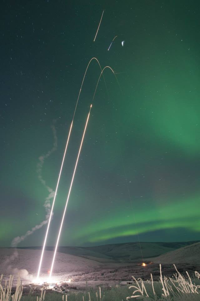 Photo by J. Adkins, NASA. Two rockets rise from Poker Flat Research Range in this composite photograph taken the night of Jan. 25-26, 2015. The aurora is visible across the sky. The 2020 rocket launch window opens Jan. 26.