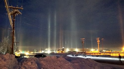 Photo by John Shook. Light reflecting off the undersides of falling ice crystals creates pillars on Feb. 7, 2020, in Fairbanks.