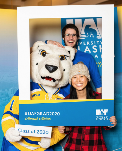 Students and Nanook practiced their Class of 2020 smiles during the Grad Fair on March 4, 2020. UAF photo by JR Ancheta.