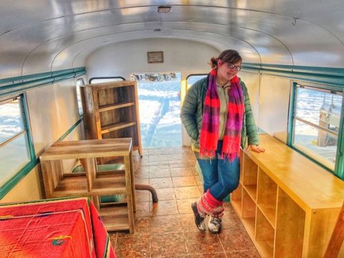Photo courtesy of Erica Moeller. Erica Moeller pauses inside her bus as she was preparing it for business in late winter 2020.